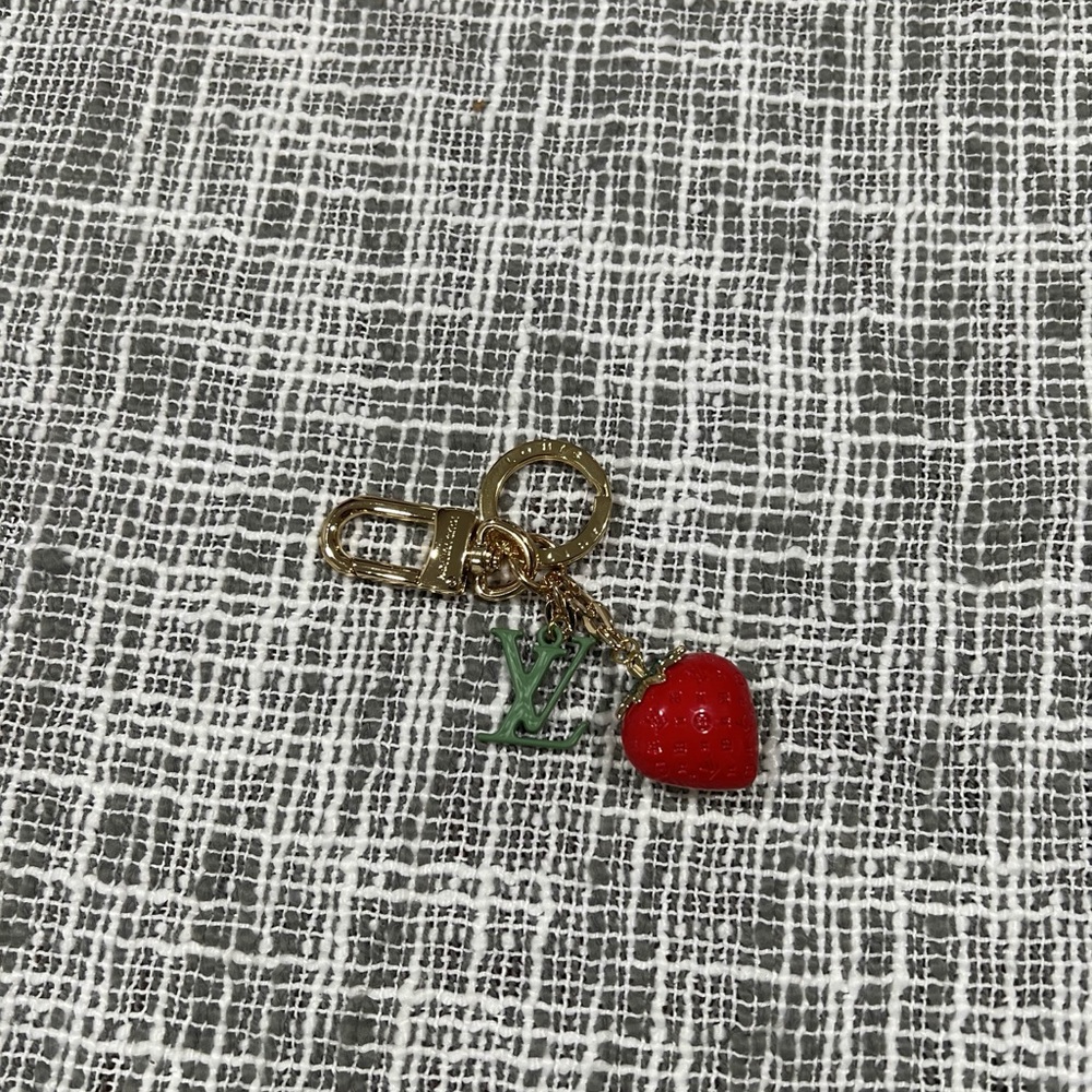 Louis Vuitton strawberry bag charm and keychain